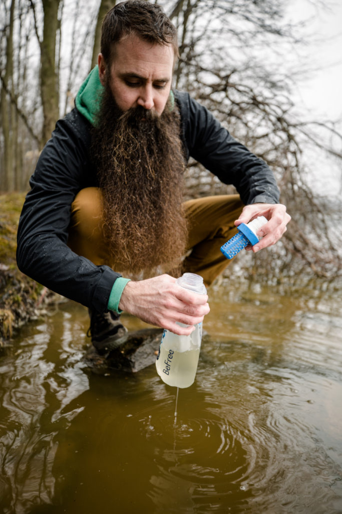 Steven using a Katadyn squeezable water filter