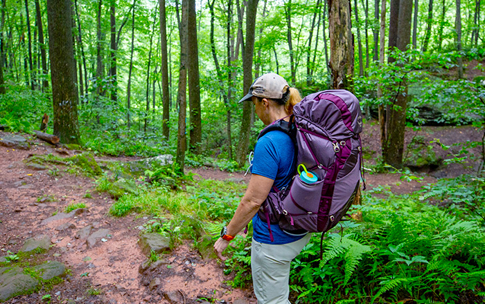 backpacker on trail outdoors