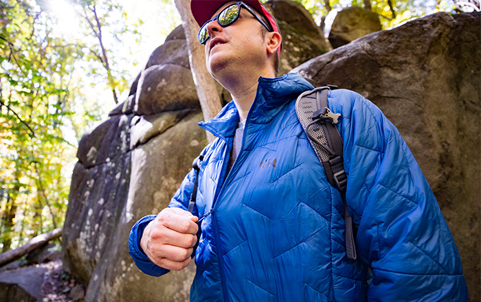 Man outdoors in insulated jacket