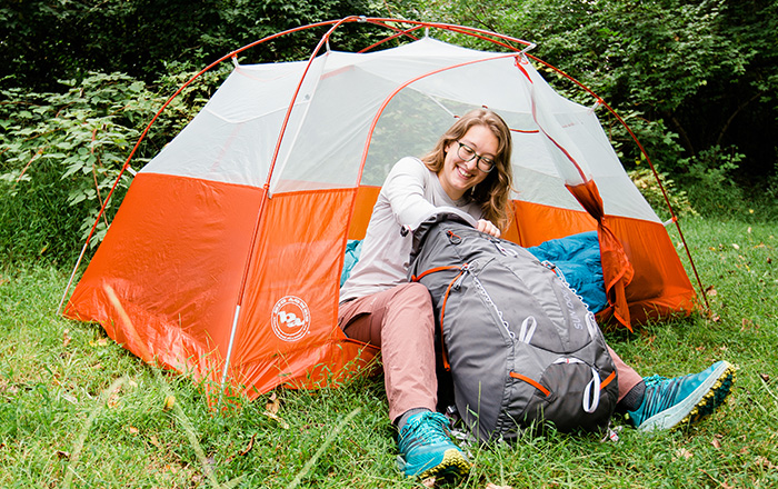 person camping outdoors
