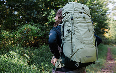 Person outdoors wearing backpack