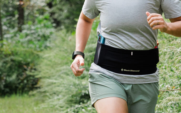 person running outdoors with Black Diamond Distance Run Belt