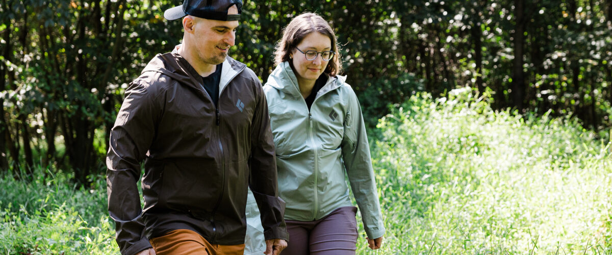 Two people outdoors wearing jackets