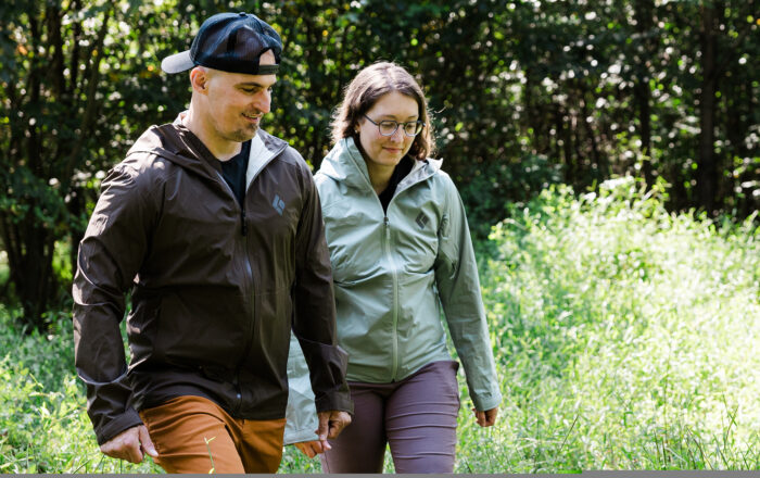 Two people outdoors wearing jackets