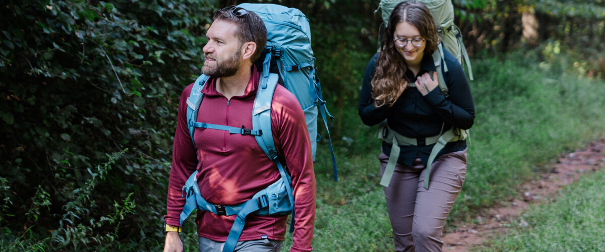 Two backpackers with Deuter Aircontact Lite packs