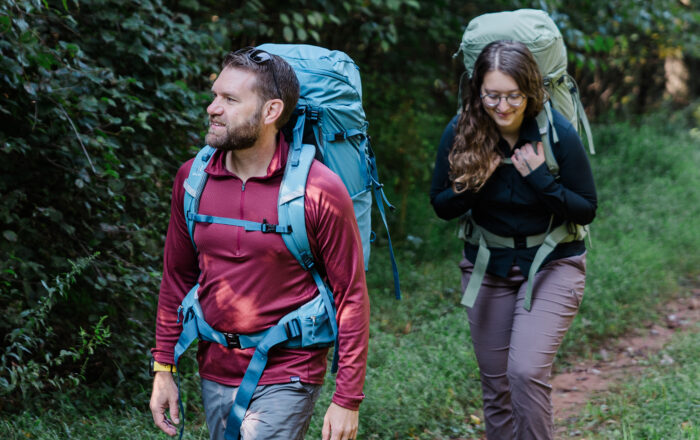 Two backpackers with Deuter Aircontact Lite packs