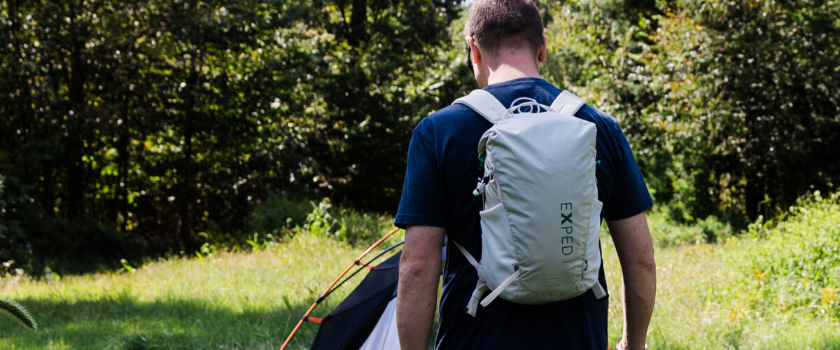 Backpacker outdoors with Exped Typhoon 15