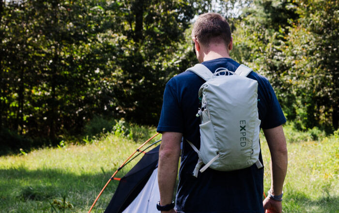 Backpacker outdoors with Exped Typhoon 15