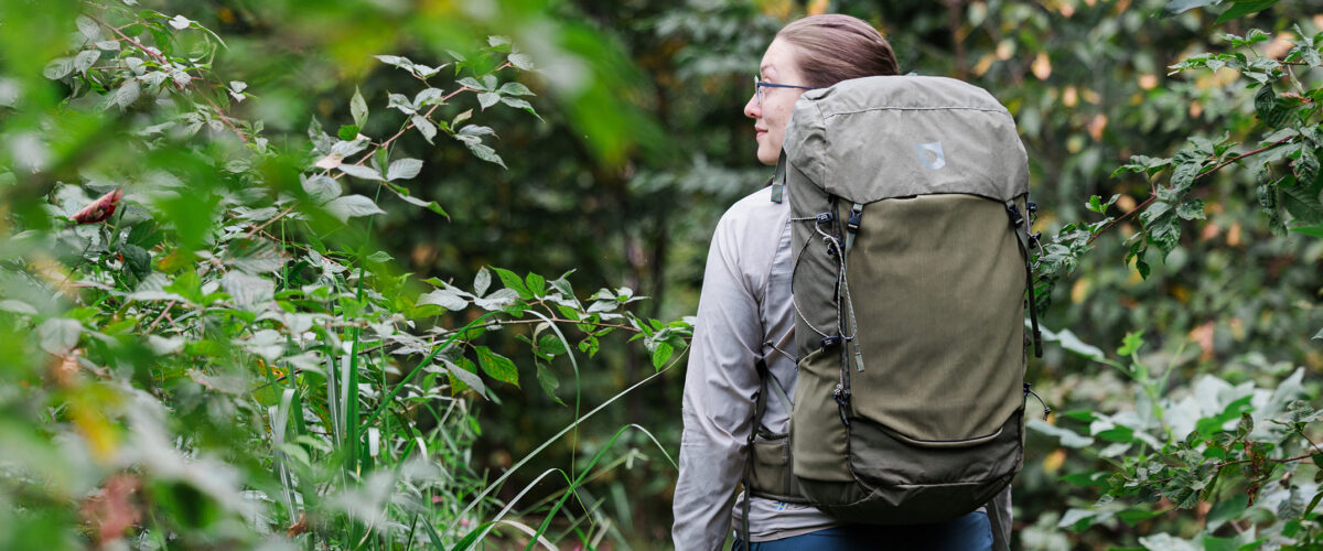 woman outdoors with Fjallraven Kajka X-Latt 45 pack