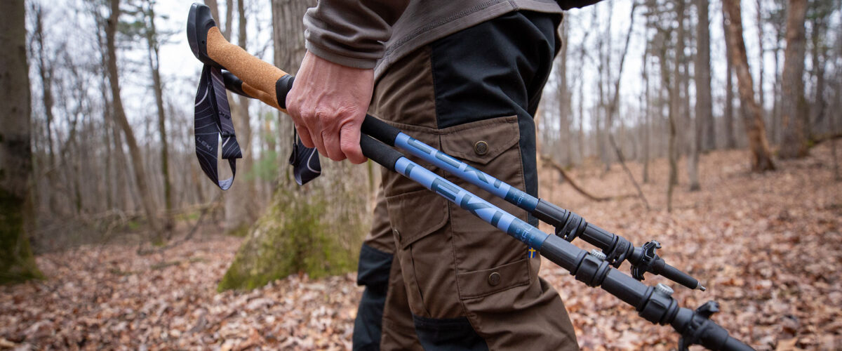 person outdoors using LEKI trekking poles