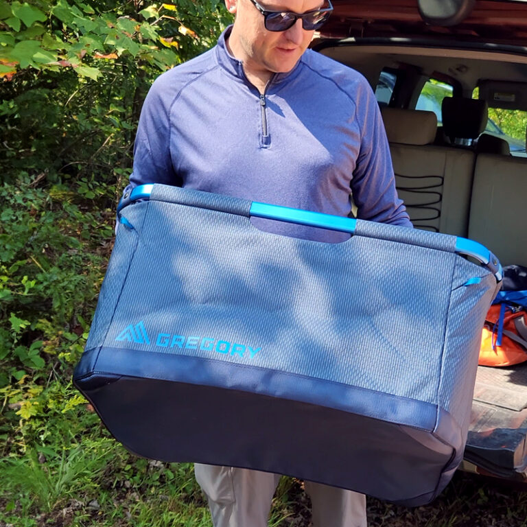 Person outdoor with camping gear