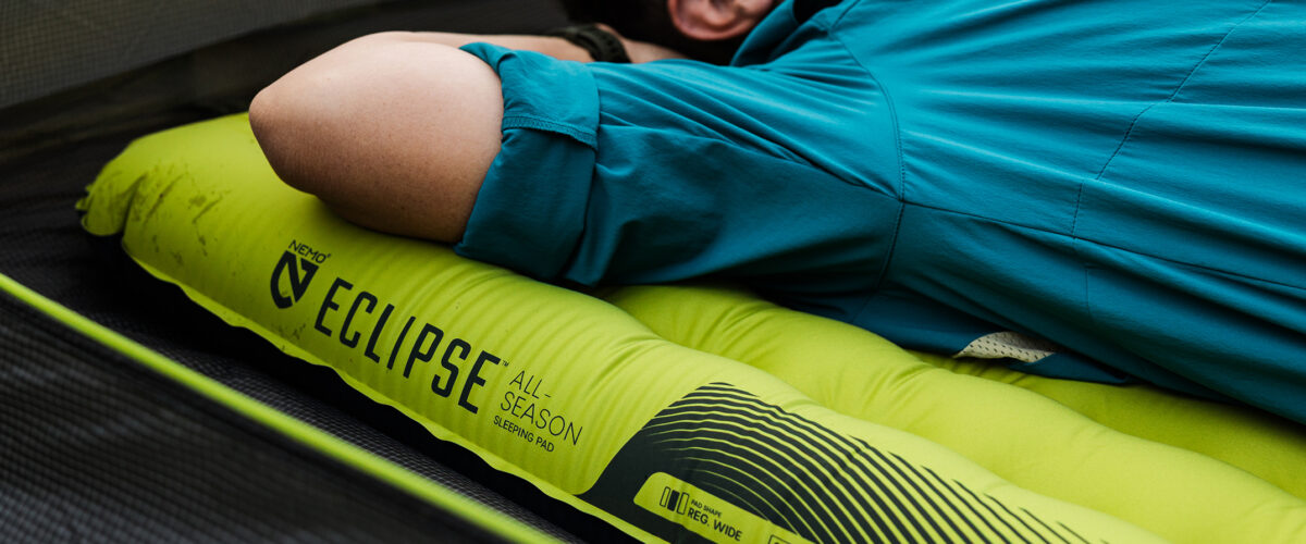 person lying on NEMO Eclipse sleeping pad