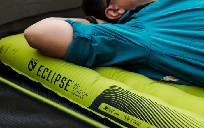 person lying on NEMO Eclipse sleeping pad