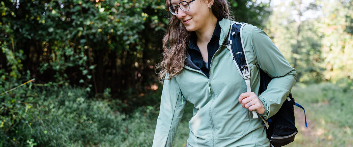 Woman outdoors wearing Rab hoody