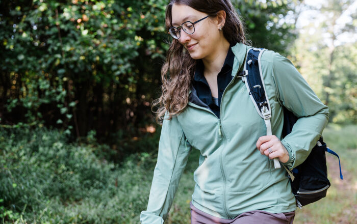 Woman outdoors wearing Rab hoody